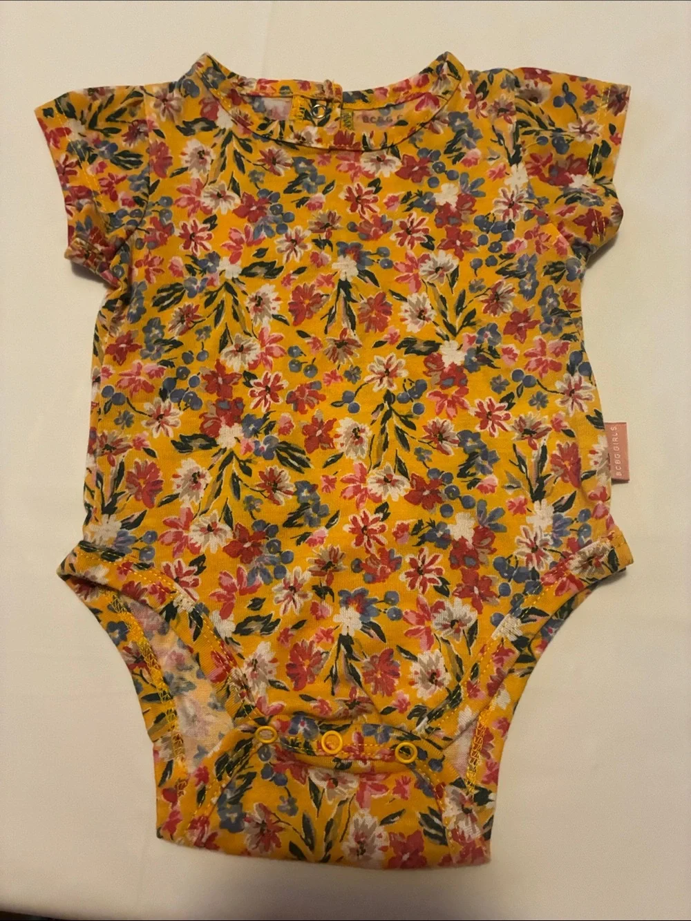 BCBG Girls Yellow Floral Baby Romper with Pink & Blue Accents